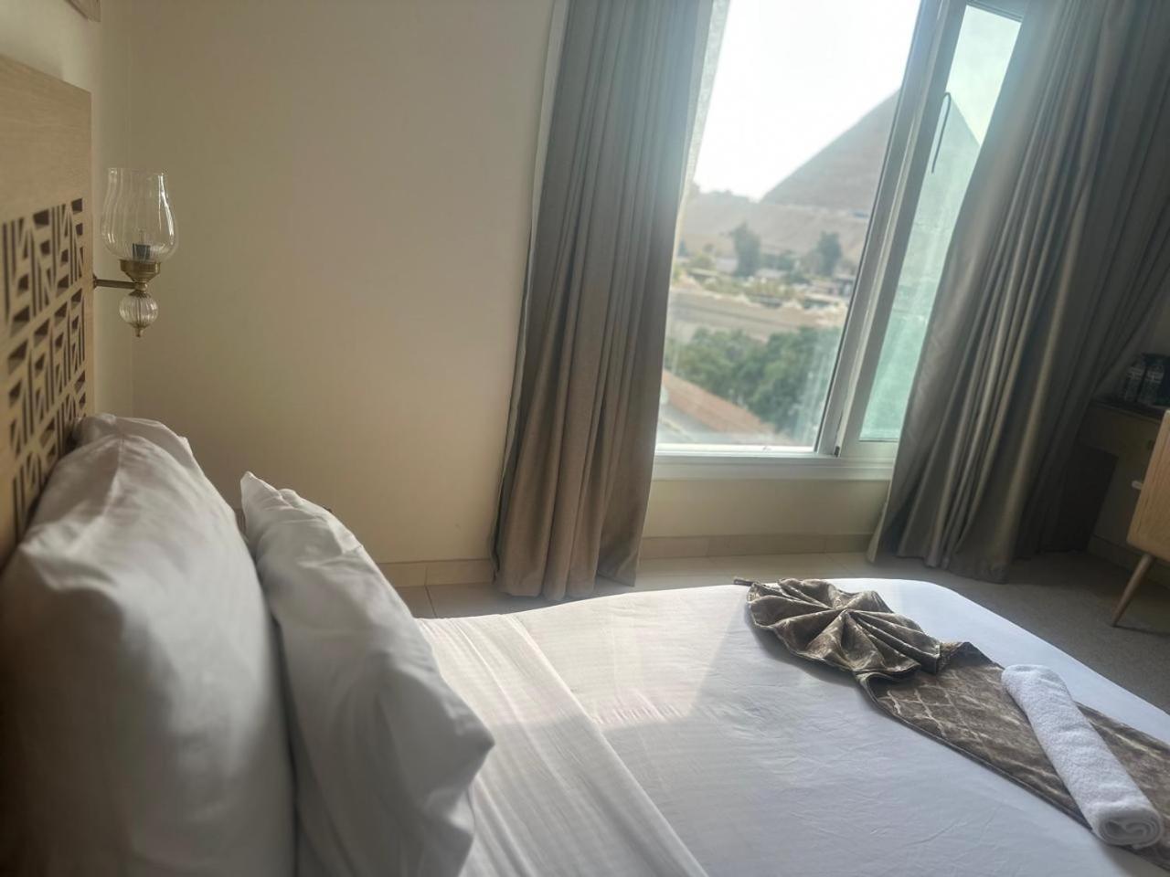 Doudou Pyramids View Hotel Kafret el-Gabal Buitenkant foto