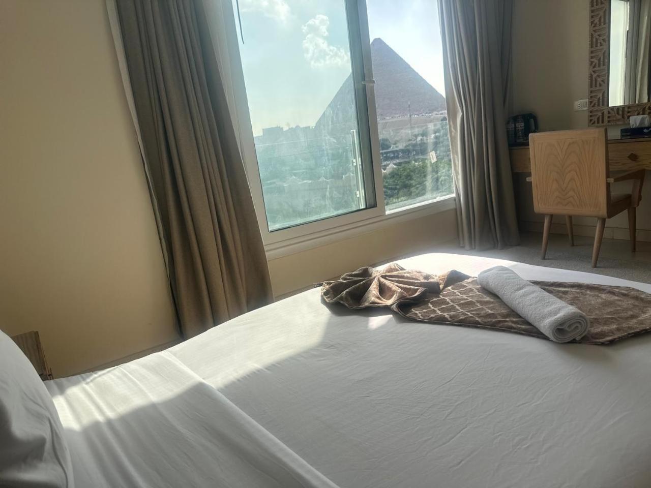 Doudou Pyramids View Hotel Kafret el-Gabal Buitenkant foto