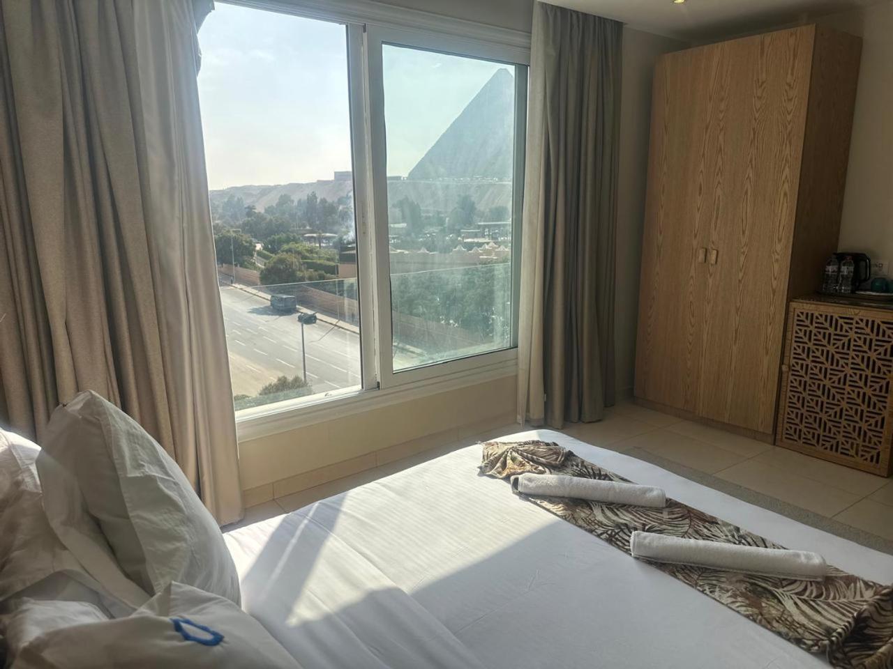 Doudou Pyramids View Hotel Kafret el-Gabal Buitenkant foto