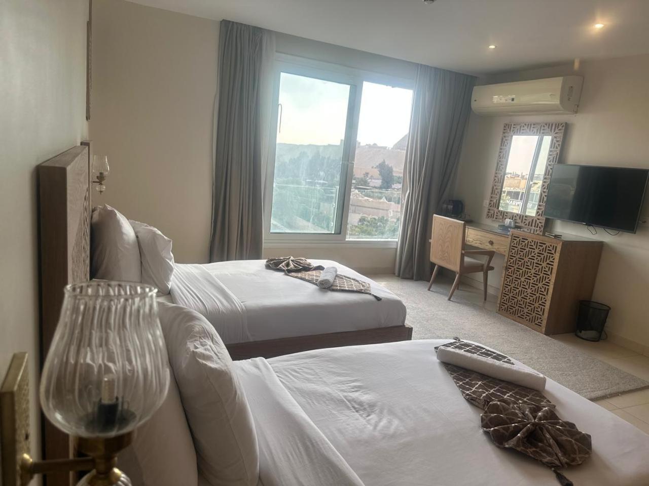 Doudou Pyramids View Hotel Kafret el-Gabal Buitenkant foto