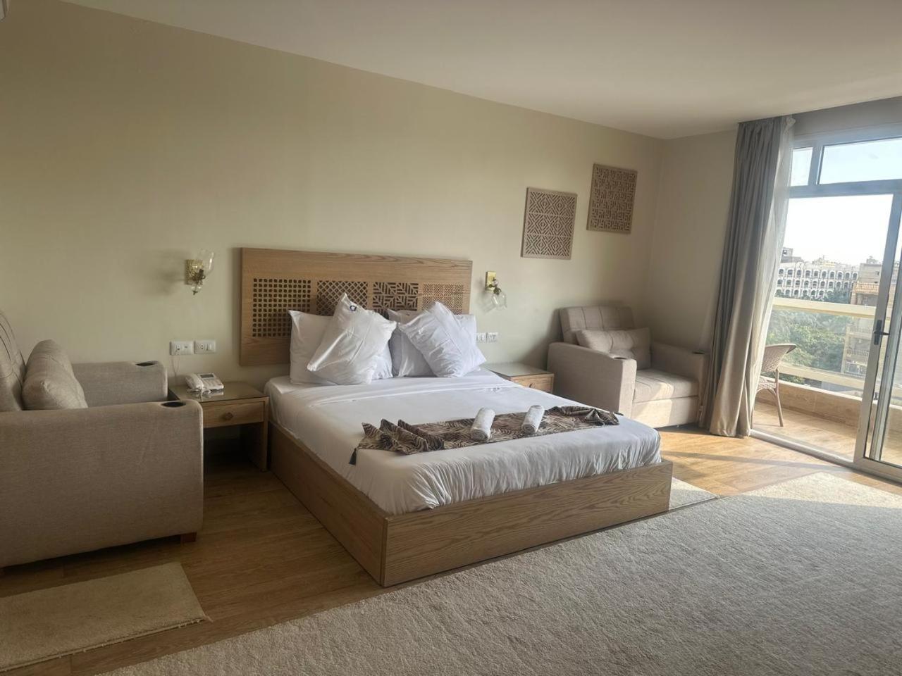 Doudou Pyramids View Hotel Kafret el-Gabal Buitenkant foto