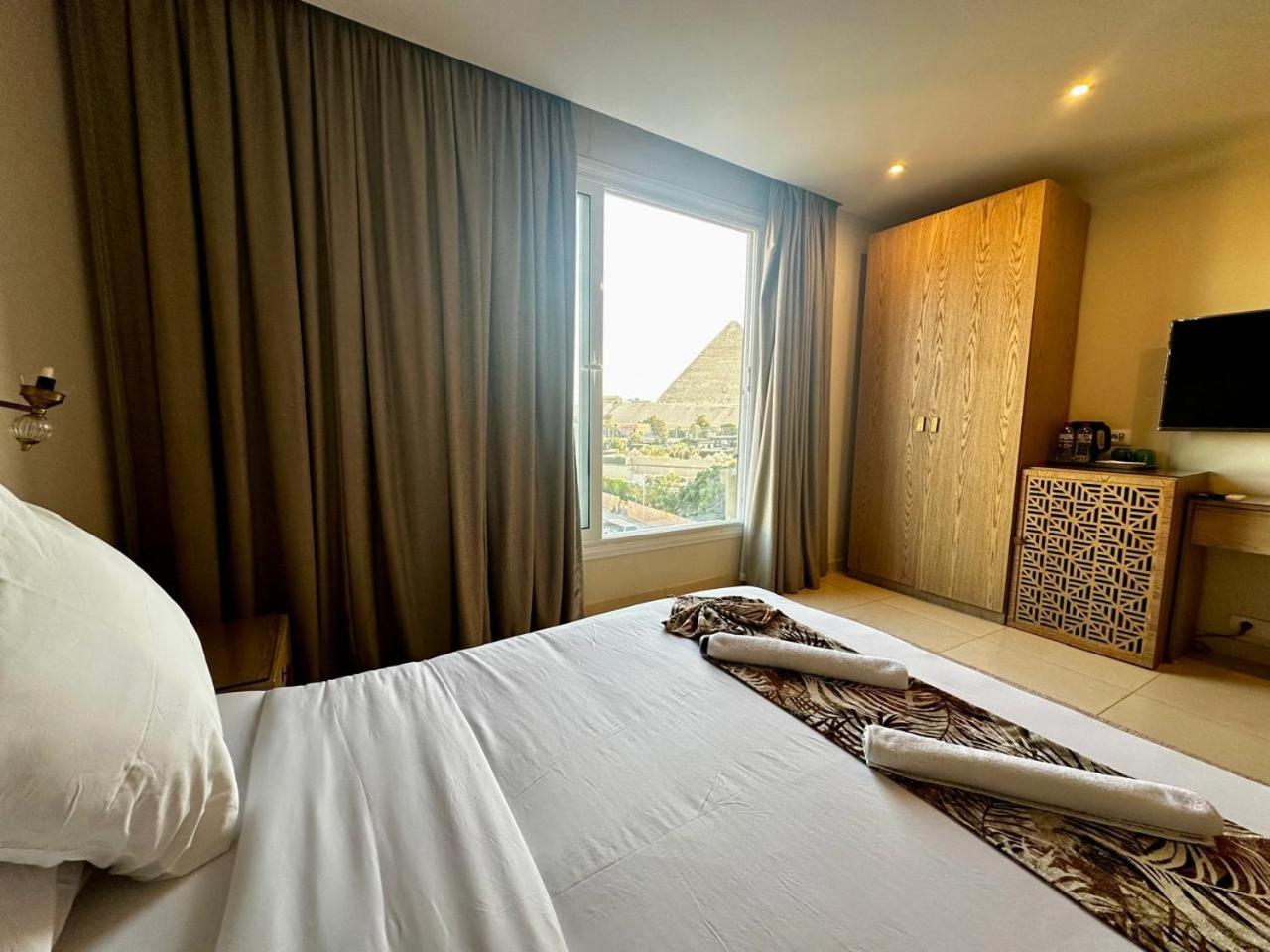 Doudou Pyramids View Hotel Kafret el-Gabal Buitenkant foto